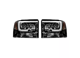 Recon Truck Accessories 05-07 f250/f350/f450/f550 projector headlights w/high power oled halos/drl-smoked/black