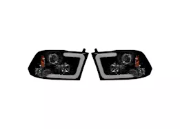 Recon Truck Accessories 09-13 ram 1500/10-14 ram 2500/3500 projector headlights w/high power oled halos/drl-smoked/black