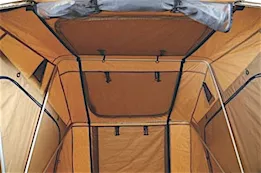 Smittybilt Overland roof top tent; folded with bedding; 12v socket; sleeps 2-3